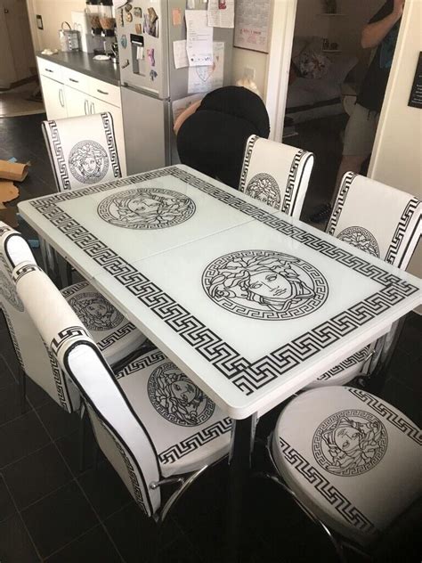 versace chair covers|Versace table and chairs.